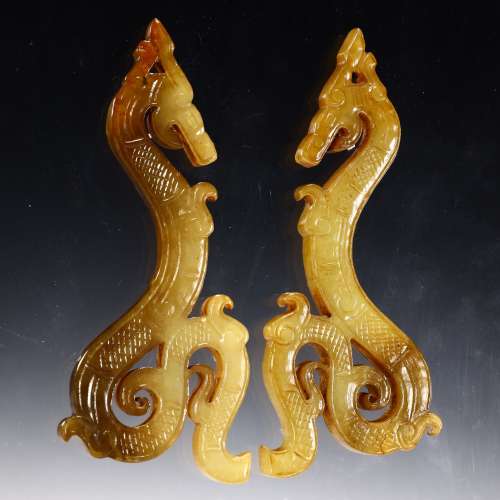 A pair of ancient jade dragon accessories