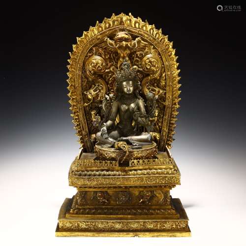Bronze gilt silver Buddha on backlit base