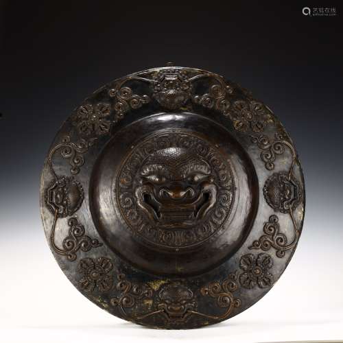 Ancient copper alloy beast head shield