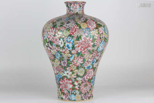 A QianLength famille-rose enamelled vase with a hundred flow...