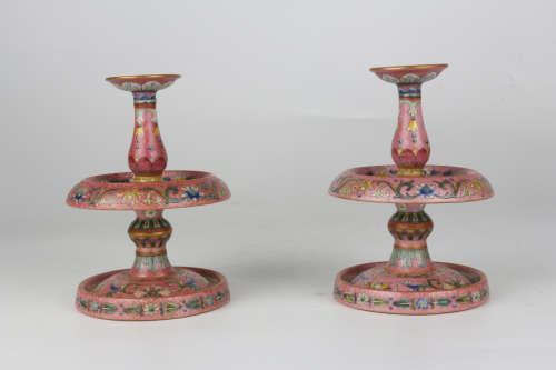 A pair of Qing QianLength enamelled candlesticks with poetic...