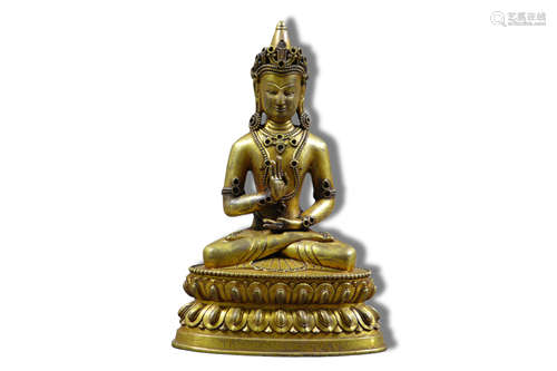 A Amoghasiddhi Gilt Bronze Figure Statue