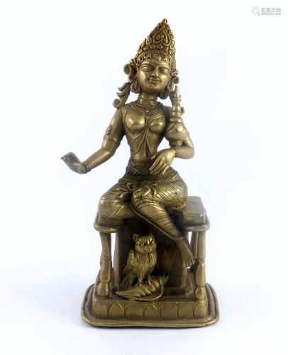 An Indian cast brass figure of the deity