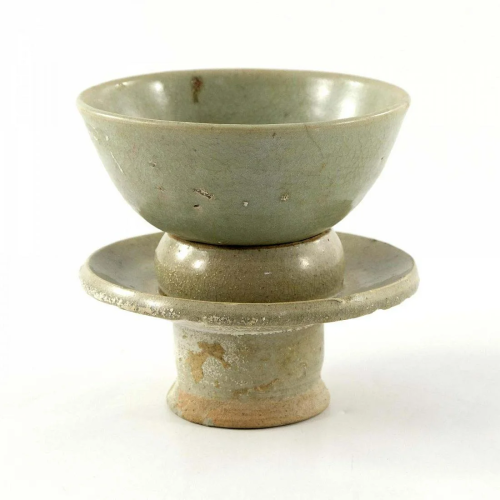 A Song Dynasty Jun tea bowl on stand, in