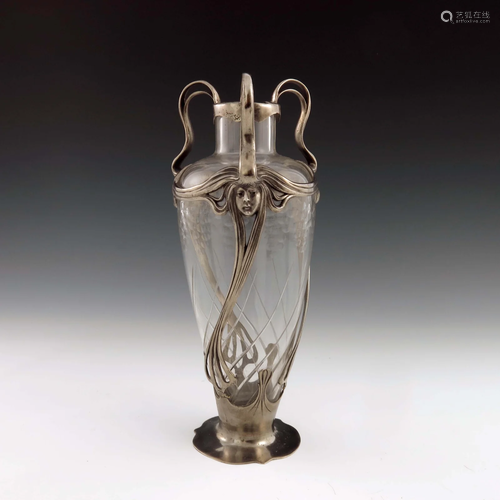 A Jugendstil pewter and cut glass vase,