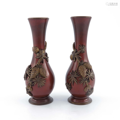 A pair of Japanese bronze baluster vases