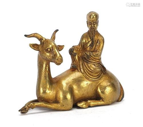 Chinese gilt bronze of a Chinese elder sitting on an