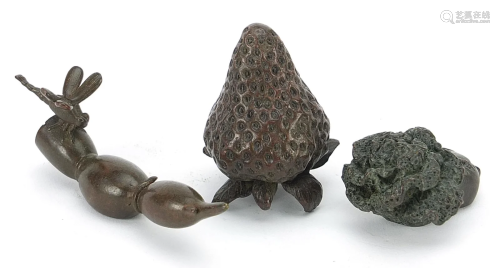 Three Japanese patinated bronze vegetables and fruits,