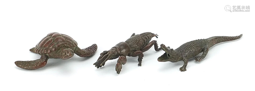 Three Japanese patinated bronze animals comprising sea