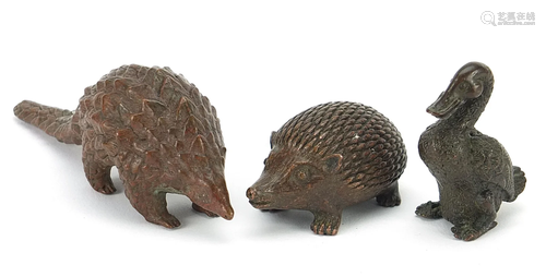 Three Japanese patinated bronze animals comprising