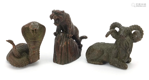 Three Japanese patinated bronze animals comprising