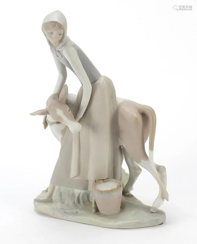 Large Lladro figure group of a female with cow having a