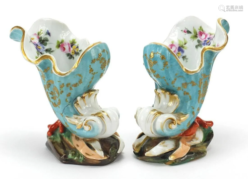 Pair of continental porcelain shell vases hand painted