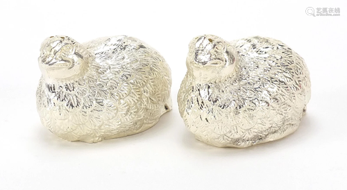 Pair of silvered quail casters, 6cm in length