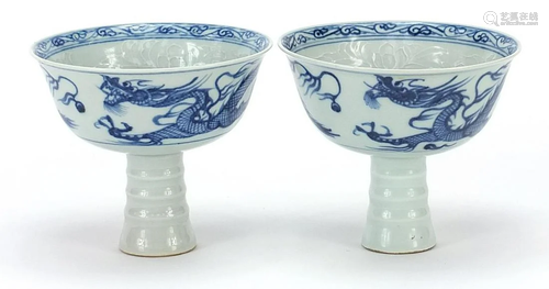 Pair of Chinese blue and white stem cup ...