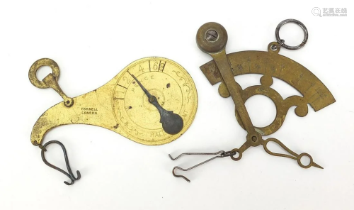 Two brass postage scales including a gil...