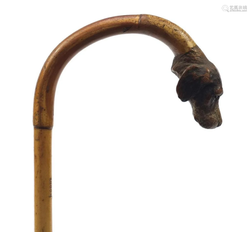 Bamboo walking stick with carved dog's head design