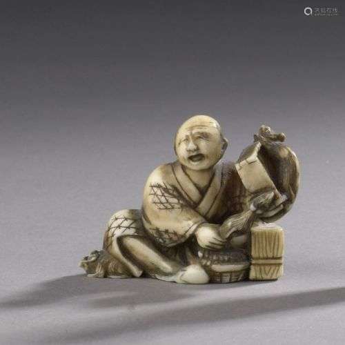 JAPON, vers 1900 Petit okimono-netsuke en ivoire représentan...