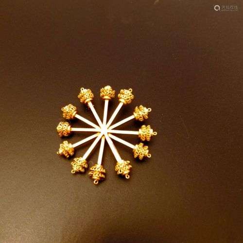 Broche en or jaune 18k (750 millièmes) de forme rayonnante à...