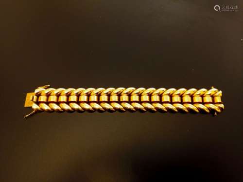 Bracelet en or jaune 750 millièmes formé de maillons navette...