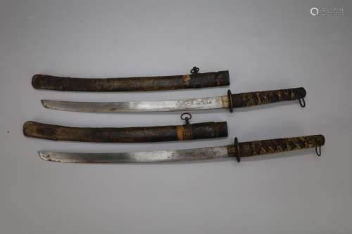 Twee Japanse katana zwaarden