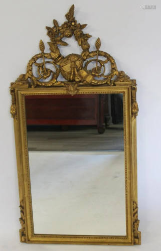 Antique Continental Carved And Giltwood Mirror.