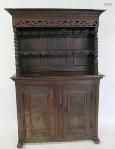 Antique Continental Carved Step Back Cabinet.