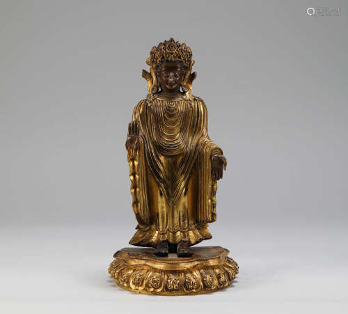 Ming Dynasty - A Gilt Bronze Standing Buddha