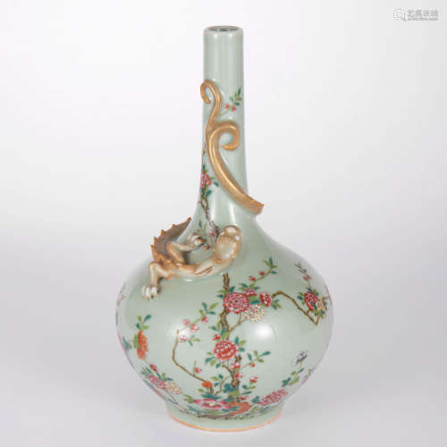 A Celadon Glaze Flower And Dragon Bottle Vase