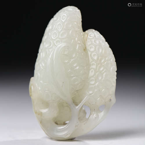 A Carved White Jade Melon Ornament