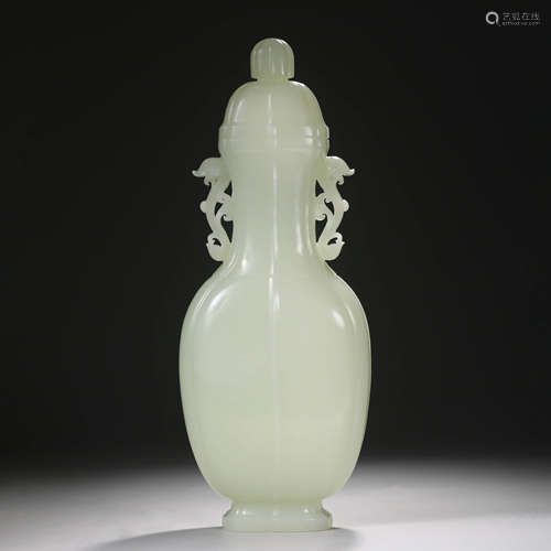 A Carved White Jade Ruyi-Eared Vase