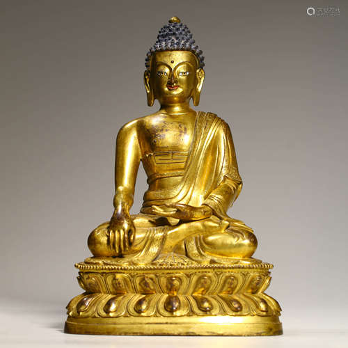 A Gilt Bronze Figure Of Shakyamuni