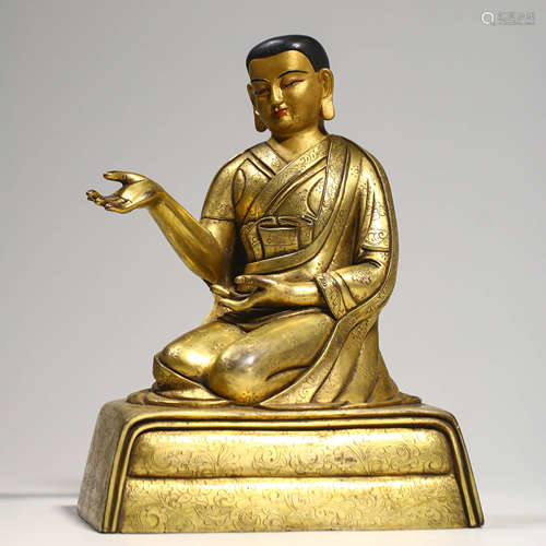 A Gilt Bronze Figure Of Buddha