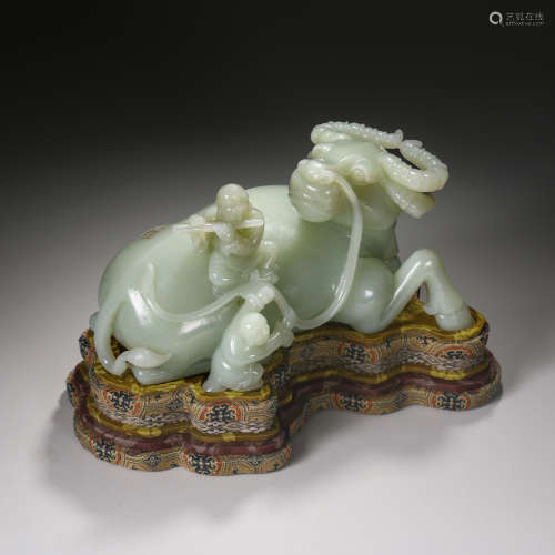 A Carved Celadon Jade And Bull Ornament