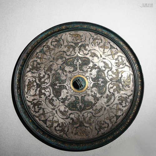 A Silver And Gold Inlaying Circular Mirror