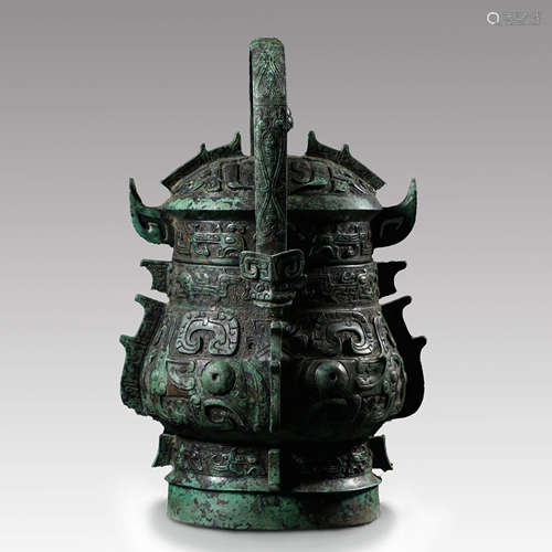 A Bronze Ritual Beast-Pattern Loop-Handle Vessel You