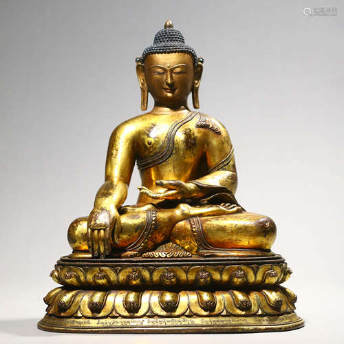 A Gilt Bronze Figure Of Shakyamuni