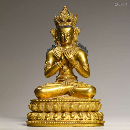 A Gilt Bronze Figure Of Buddha