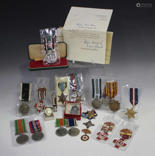 A 1939-45 Defence Medal and a Police Long Service and Good C...