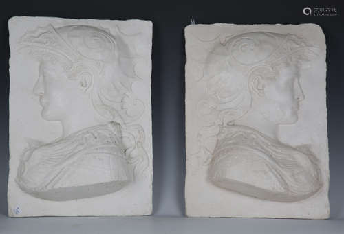 A pair of 20th century cast plaster panels depicting classic...