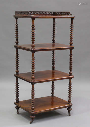 A Victorian mahogany four-tier whatnot with pierced gallery ...