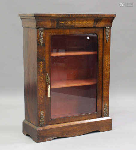 A mid-Victorian walnut and foliate inlaid pier cabinet with ...