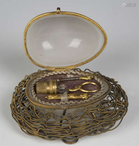 An early 20th century opaline glass and metal mounted nécess...
