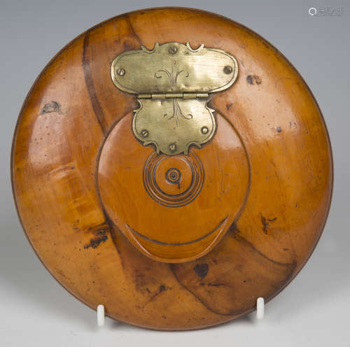 An early 19th century Continental fruitwood circular table s...