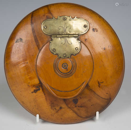 An early 19th century Continental fruitwood circular table s...