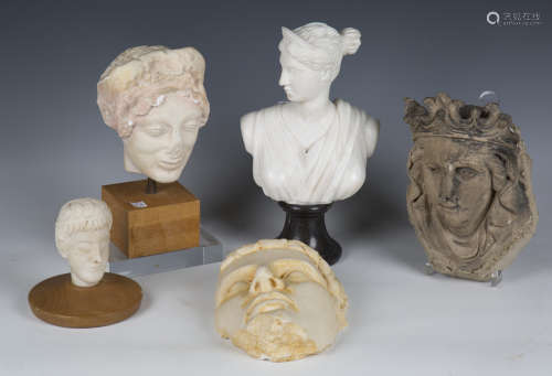A 20th century Continental carved white marble head and shou...