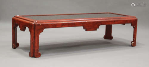 A 20th century red painted chinoiserie coffee table, the gla...