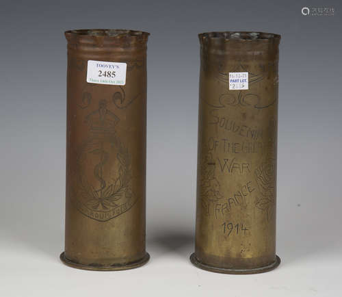 A pair of First World War period brass shell cases, each wit...