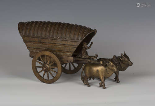 A late 19th century brown patinated bronze model of an ox-dr...