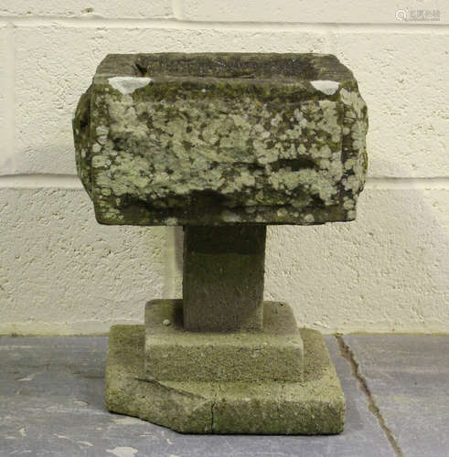 A 20th century carved stone bird bath on a stepped base, hei...